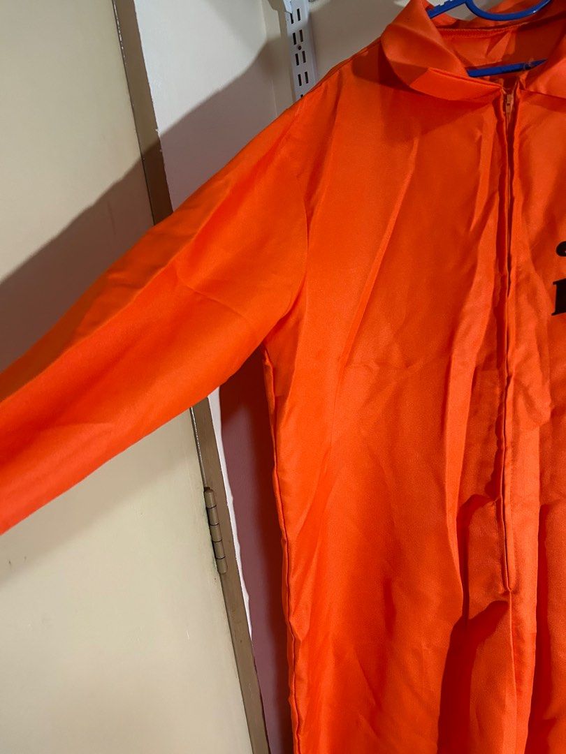 Orange Jail Bird Costume Halloween (Category: Sets & Coordinates) located in Singapore. Submitted by 4.44am (Listing ID 1380485333, Image 2). Description: This is an orange 'Jail Bird' costume. It is a full-body jumpsuit with a zipper down the front. The words 'JAIL BIRD' are printed on the chest. Perfect for Halloween or costume parties! For height 170cm? I am 160cm I used this for a halloween event have to fold up the pants No other questions.