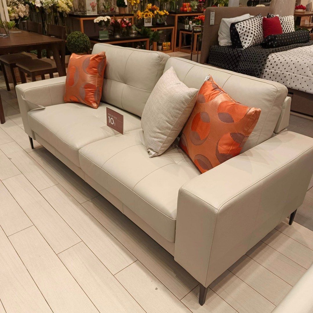 Our Home 3-seater Leather Sofa (Category: Sofas) located in Manila. Submitted by sulitrepo (Listing ID 1380305772, Image 1). Description: Lindy 3-seater Leather Sofa Uruguay half leather with soft tuft back cushion Wood frame Metal footings Very comfortable to sit on Brand new Still at Our Home, ready for pick up anytime RFS: Change of mind Dimensions: 200L x 87W x 74H x 41H cm Color: Light gray (looks cream-gray) Selling for 43,890 SRP 49,950 *P
