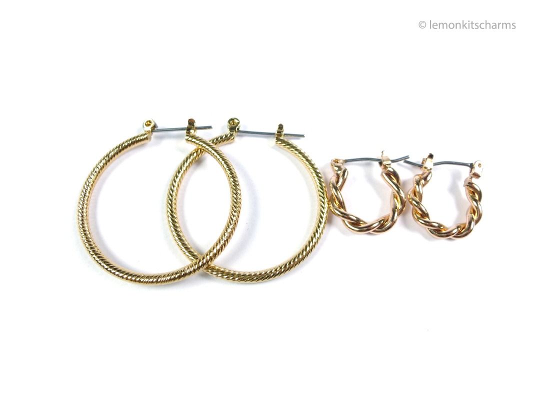 Pair of Vintage Simple Hoop Pierced Earrings, er2701-ci (Category: Earrings) located in Singapore. Submitted by lemonkitscharms (Listing ID 1380395726, Image 1). Description: Pair of vintage 1990s - 2000s Hoop Earrings, for pierced ears. One of the front hinge is soldered slightly slanted on the small rose-goldtone earrings. The other pair of earrings is in very good condition, goldtone with a striped texture. Price excludes postage. Check my pro
