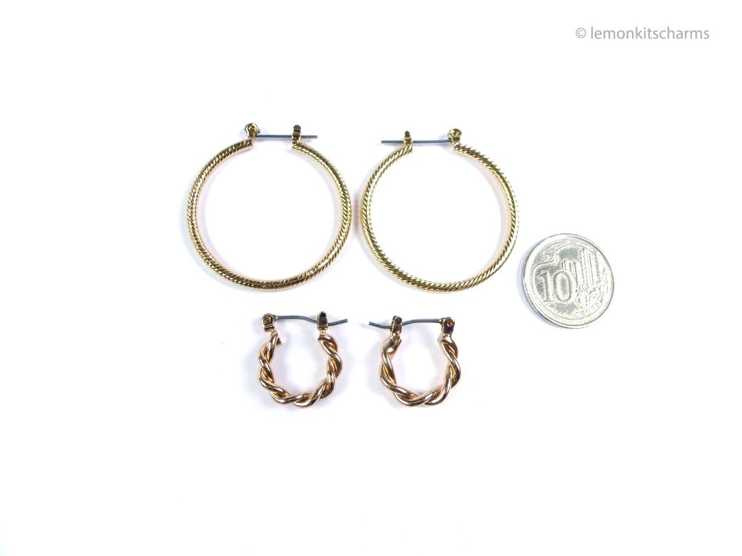Pair of Vintage Simple Hoop Pierced Earrings, er2701-ci (Category: Earrings) located in Singapore. Submitted by lemonkitscharms (Listing ID 1380395726, Image 2). Description: Pair of vintage 1990s - 2000s Hoop Earrings, for pierced ears. One of the front hinge is soldered slightly slanted on the small rose-goldtone earrings. The other pair of earrings is in very good condition, goldtone with a striped texture. Price excludes postage. Check my pro
