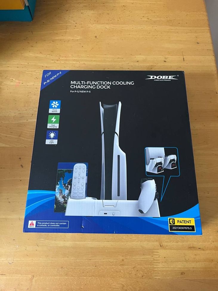 PS5 OG(Fat) Version White DOBE Cooling and Charging Dock (Category: PlayStation) located in Meycauayan. Submitted by joseph1356 (Listing ID 1380410064, Image 1). Description: Selling my barely used PS5 DOBE Charging dock for my PS5 OG Version unit. Includes all parts and manual. Price is still negotiable, specially for serious buyers RFS: Decluttering my PS collection.