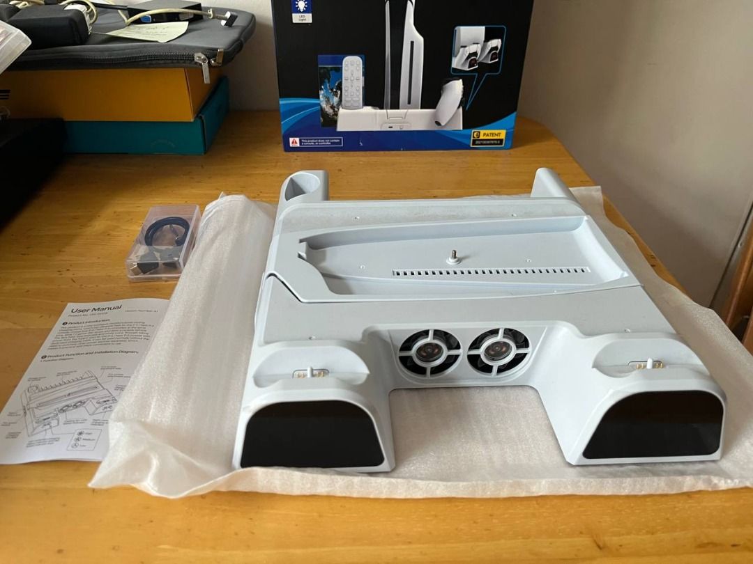 PS5 OG(Fat) Version White DOBE Cooling and Charging Dock (Category: PlayStation) located in Meycauayan. Submitted by joseph1356 (Listing ID 1380410064, Image 2). Description: Selling my barely used PS5 DOBE Charging dock for my PS5 OG Version unit. Includes all parts and manual. Price is still negotiable, specially for serious buyers RFS: Decluttering my PS collection.