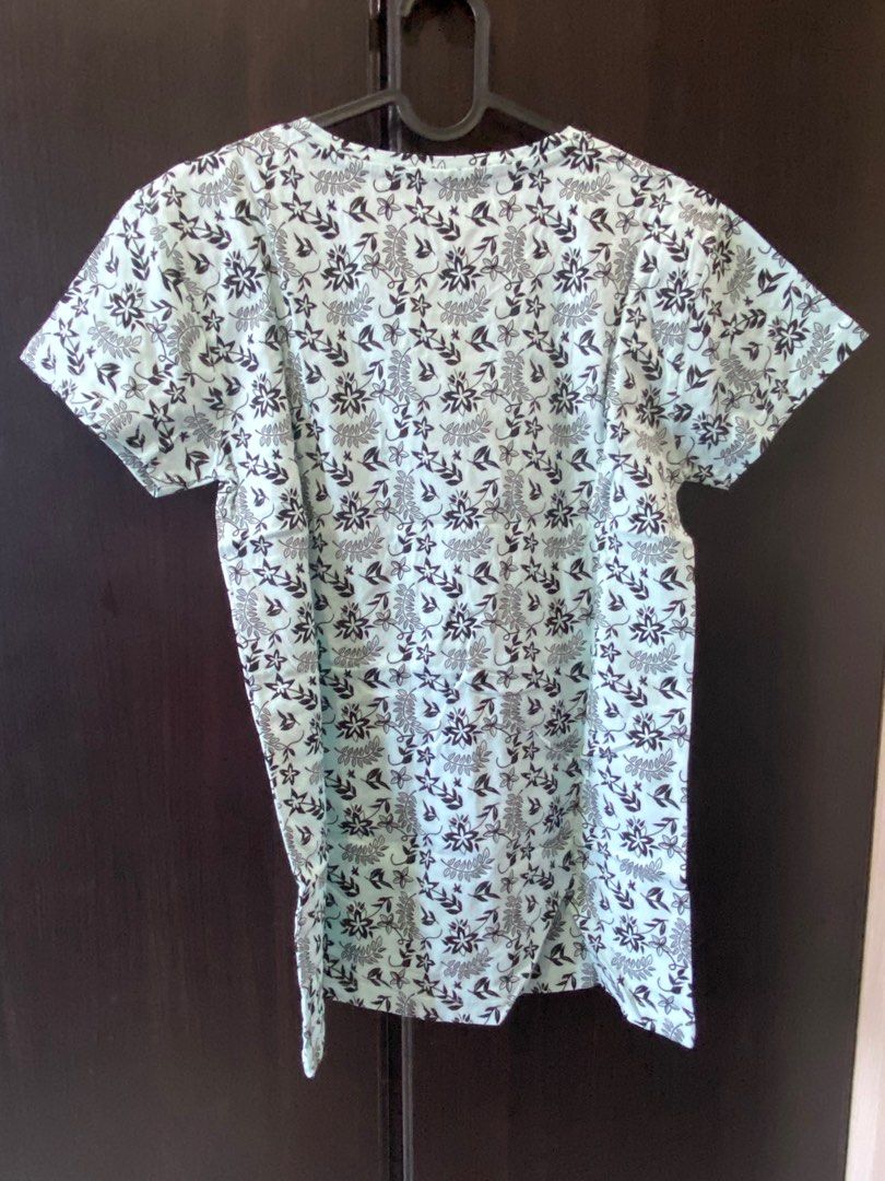 Pull & Bear Light Blue T-shirt with Black Floral Print (Category: Blouses) located in Quezon City. Submitted by corncarts (Listing ID 1380424575, Image 2). Description: Brand: Pull & Bear L on tag (34” x 26”) Light blue with black floral print T shirt with scoop neck Cotton material, very presko Slight stretch brand new with tags.