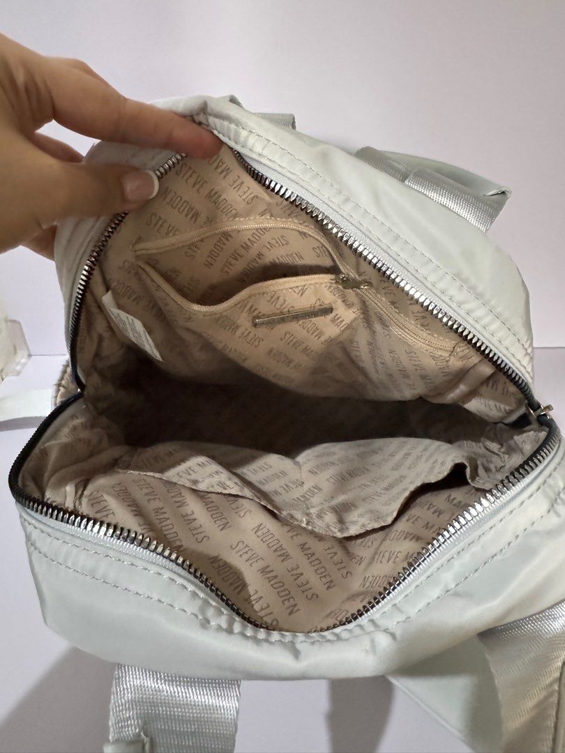 Original Steve Madden Puffer Mini Backpack (Category: Backpacks) located in Caloocan City. Submitted by decluttrqueen (Listing ID 1380457440, Image 2). Description: Steve Madden Puffer Mini Backpack With slight peeling of rubber in the puller (as shown in the picture) not from use but due to being stocked Multiple compartment and with free pouch Original from the US Nylon Can do 3 months layaway 0% interest with 1k deposit (non-refundable) Shipme