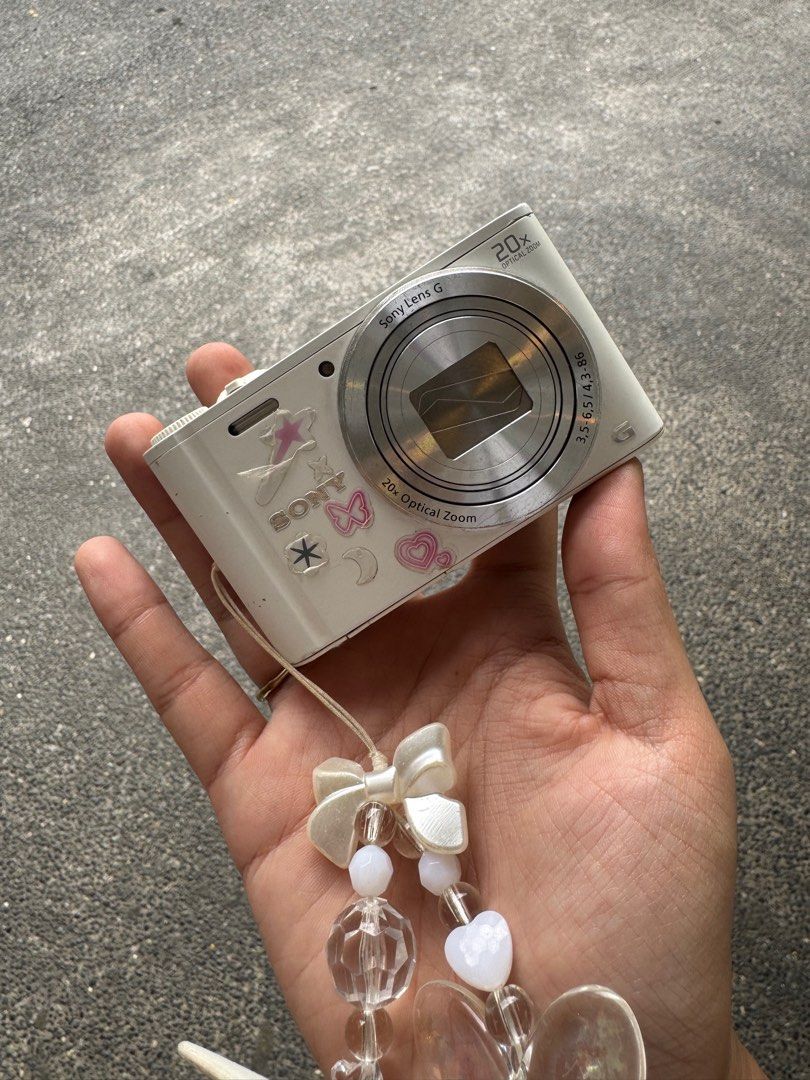 Sony DSC-WX350 (RARE CAM!!!) (Category: Cameras) located in Caloocan City. Submitted by _gwennydt (Listing ID 1380378293, Image 1). Description: Sony Cybershot DSC-WX350 (White) Features: 18.2 MP Exmor R CMOS sensor 20x Optical zoom Up to ISO 12800 1080p HD video recording Wifi supported Many scene selections 3” LCD monitor All functions are working—flash, buttons, zoom, video, audio Crisp photos! Inclusions: Battery, charger, memory card, strap 