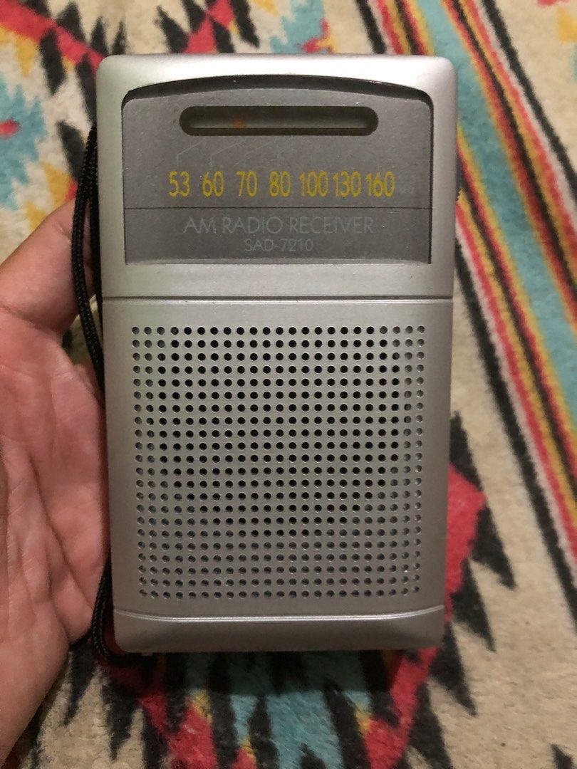 Soundlook portable AM receiver (Category: Portable Music Players) located in Quezon City. Submitted by markgolveo (Listing ID 1380411486, Image 1). Description: Soundlook portable AM receiver Tested okay all features working properly Good signal coverage Good speakers clear crisp audio output Good headphone jack 2pcs AA batteries operated.