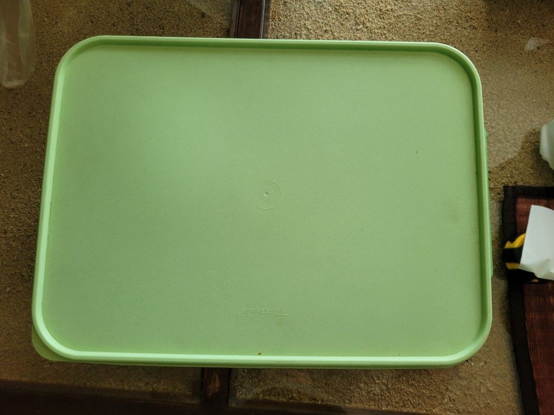 Tupperware (Category: Food Organisation & Storage) located in Singapore. Submitted by teresa1368 (Listing ID 1380345682, Image 3). Description: Tupperware Vegetables or fruits storage box. Color: Green. Size: 14 inch x 10.5 inch x 7 inch Price: $18.