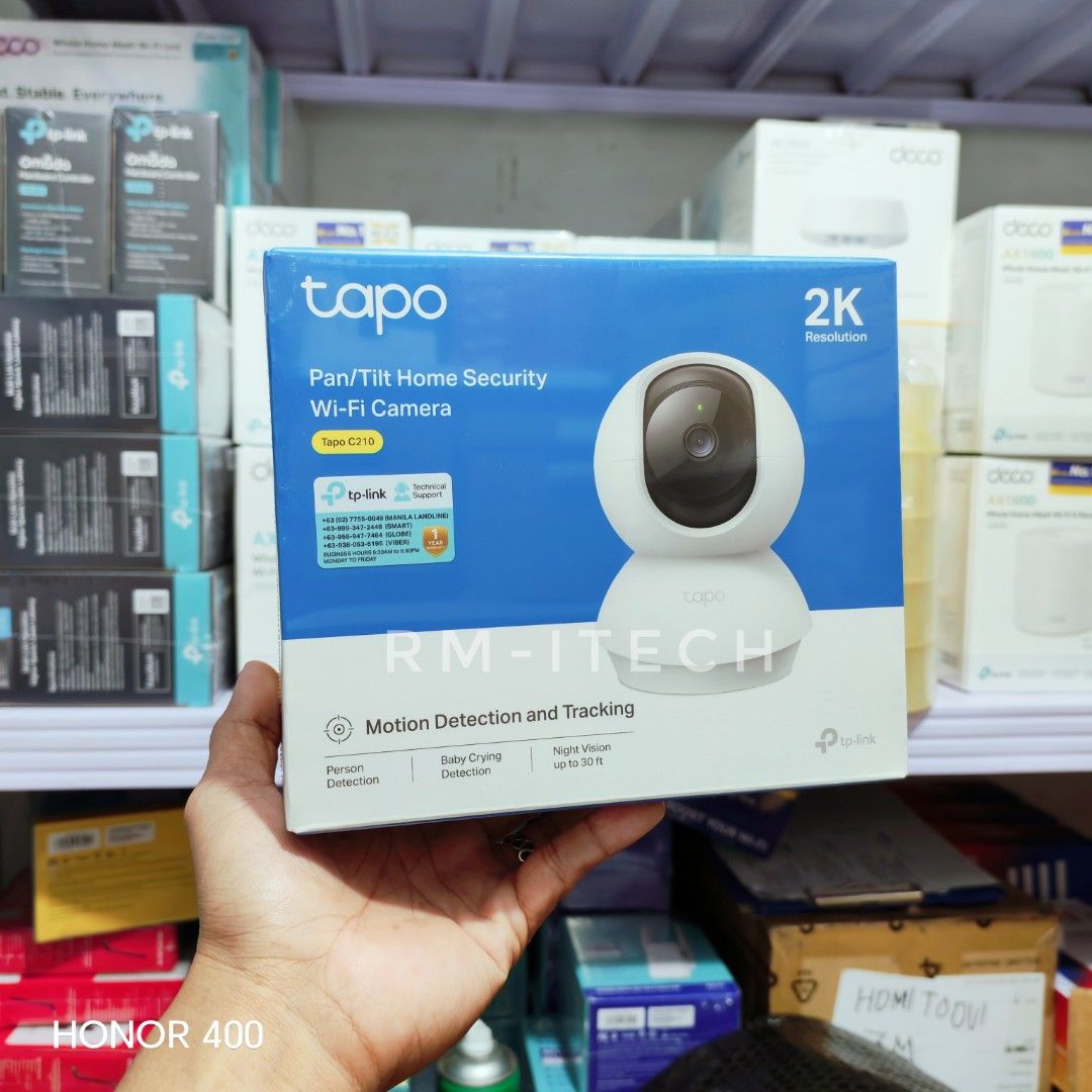 tapo Pan/Tilt Home Security Wi-Fi Camera (Category: Security Systems & CCTV Cameras) located in Manila. Submitted by rm.itech051523 (Listing ID 1380329706, Image 3). Description: Pan/Tilt Home Security Wi-Fi Camera Model: Tapo C210 Field of View: 360° Horizontal Video Definition: 2K Definition (2304 × 1296 px) Audio: TWo-Way (Built-in Microphone and Speaker) Night Vision: 850 nm IR LED (Up to 30 ft) Wireless Protocols: IEEE 802.11b/g/n, 2.4 GHZ8 