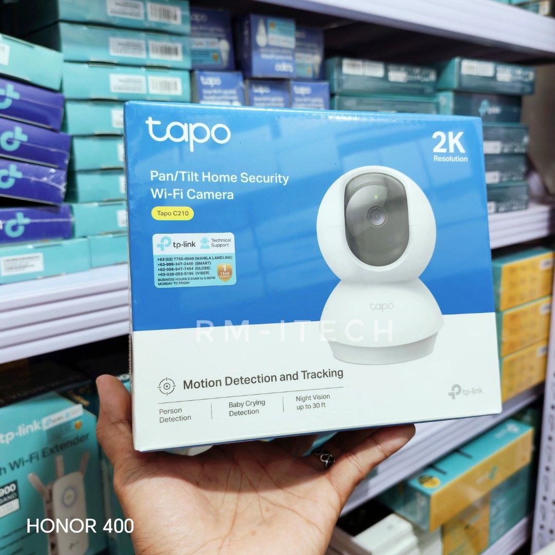 tapo Pan/Tilt Home Security Wi-Fi Camera (Category: Security Systems & CCTV Cameras) located in Manila. Submitted by rm.itech051523 (Listing ID 1380329706, Image 1). Description: Pan/Tilt Home Security Wi-Fi Camera Model: Tapo C210 Field of View: 360° Horizontal Video Definition: 2K Definition (2304 × 1296 px) Audio: TWo-Way (Built-in Microphone and Speaker) Night Vision: 850 nm IR LED (Up to 30 ft) Wireless Protocols: IEEE 802.11b/g/n, 2.4 GHZ8 