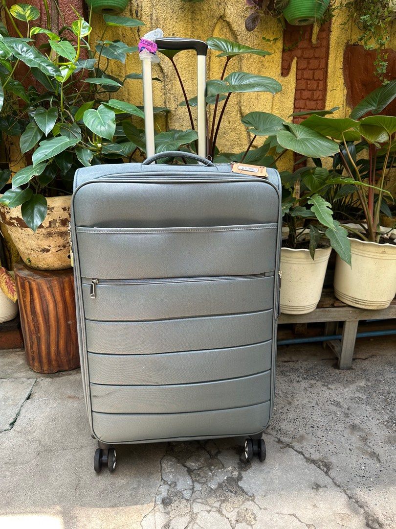 Travel Basic LARGE luggage (Category: Luggage) located in Valenzuela. Submitted by kaelstoypalace (Listing ID 1380476811, Image 2). Description: TSA LOCK A bit dusty Never used.