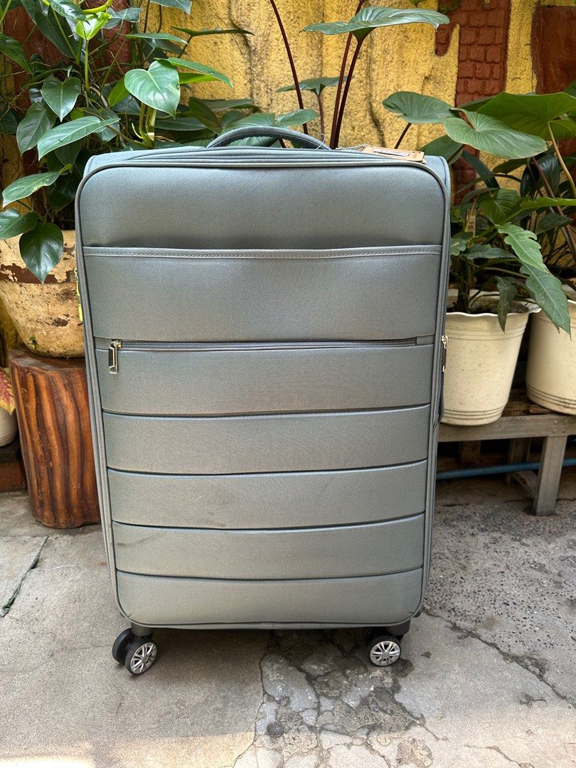 Travel Basic LARGE luggage (Category: Luggage) located in Valenzuela. Submitted by kaelstoypalace (Listing ID 1380476811, Image 1). Description: TSA LOCK A bit dusty Never used.