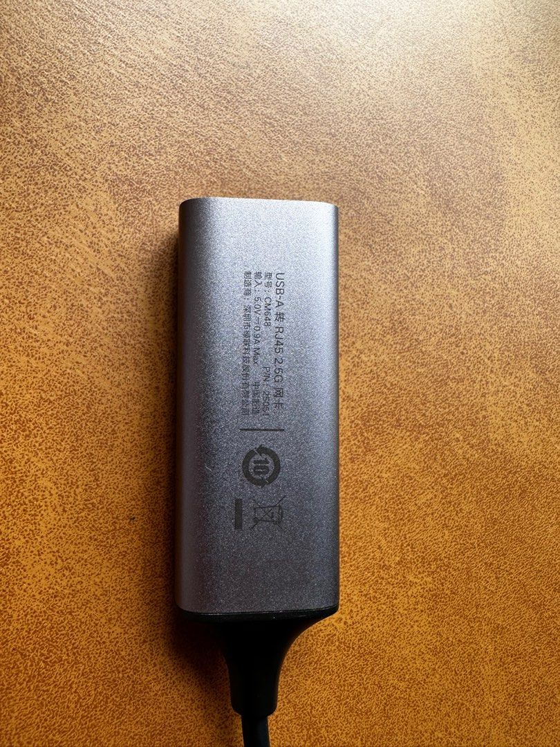 Ugreen USB-A to RJ45 2.5G Ethernet Adapter (Category: Cables & Adaptors) located in Singapore. Submitted by turly221 (Listing ID 1380360672, Image 2). Description: This Ugreen USB-A to RJ45 2.0G Ethernet Adapter is in excellent condition. It allows you to connect to a wired network via USB. The adapter is compact and easy to use. Perfect for laptops or devices without a built-in Ethernet port..