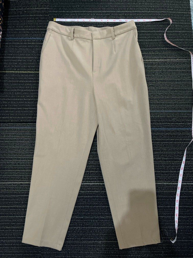 Uniqlo trouser in khaki (Category: Other Bottoms) located in Mandaluyong City. Submitted by buchoyShop (Listing ID 1380329776, Image 1). Description: To small on me. Declutter .