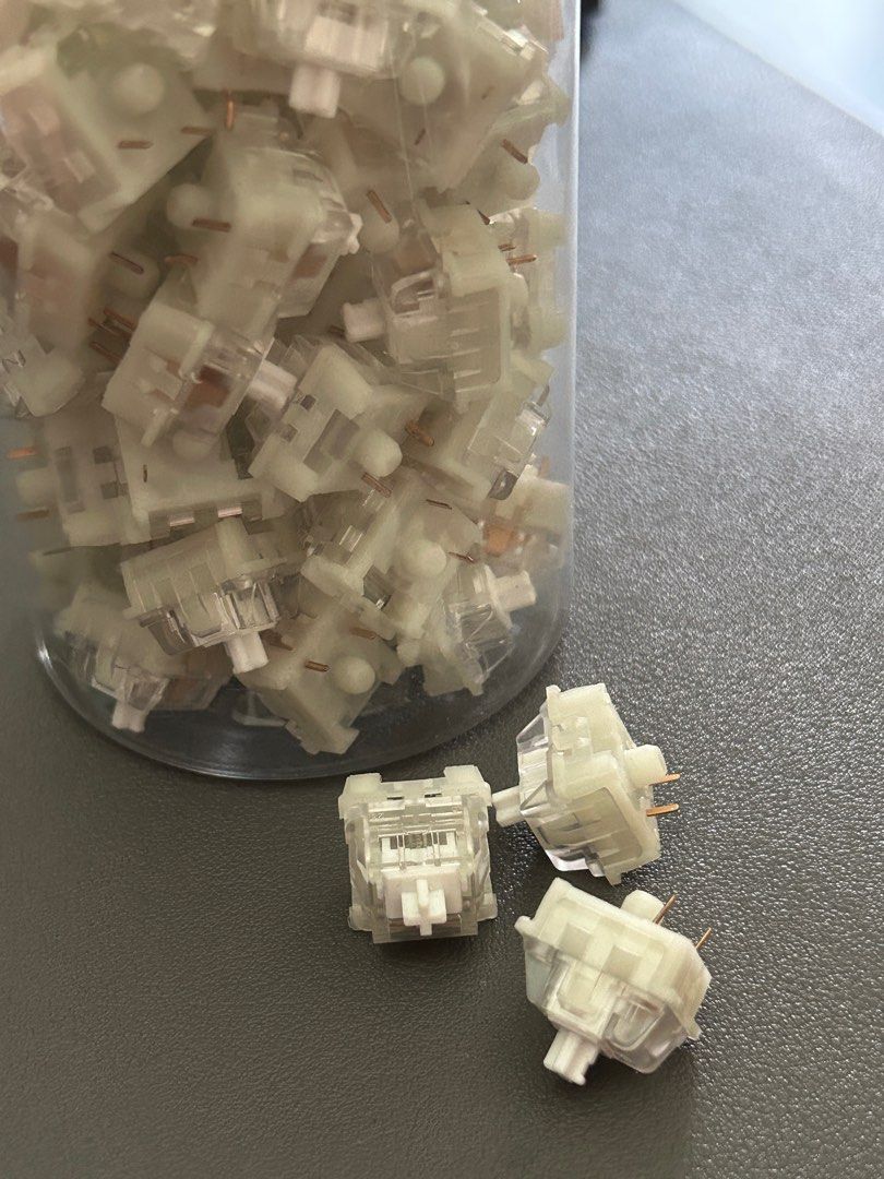 80 pcs KTT Kang White V3 Switches (Category: Computer Keyboard) located in Antipolo. Submitted by saaramos (Listing ID 1380640905, Image 2). Description: 80 pcs KTT Kang White V3 Switches With plastic container RFS: Decluttering / upgraded MOP: Paymaya / Gotyme Delivery: LBC, J&T, Lalamove (for SDD) - to be shouldered by the buyer .