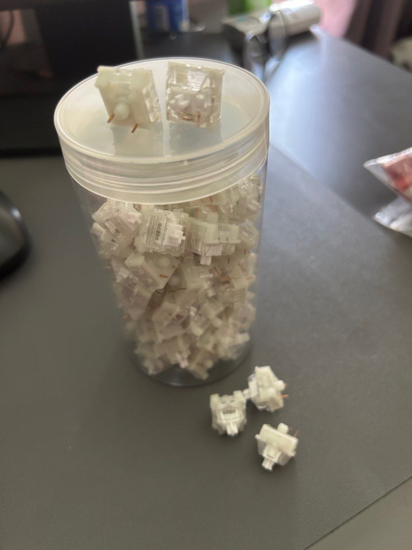 80 pcs KTT Kang White V3 Switches (Category: Computer Keyboard) located in Antipolo. Submitted by saaramos (Listing ID 1380640905, Image 3). Description: 80 pcs KTT Kang White V3 Switches With plastic container RFS: Decluttering / upgraded MOP: Paymaya / Gotyme Delivery: LBC, J&T, Lalamove (for SDD) - to be shouldered by the buyer .