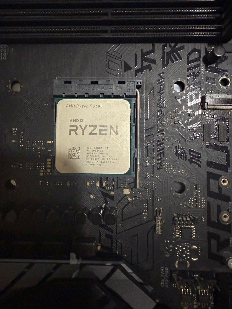 ASUS ROG Strix B450-F Gaming Motherboard + Ryzen 5 3600 CPU (Category: Computer Parts) located in Singapore. Submitted by strixz (Listing ID 1380588254, Image 1). Description: Selling an ASUS ROG Strix B450-F Gaming motherboard with an AMD Ryzen 5 3600 CPU. Both are in excellent condition. The motherboard comes with its original box. Perfect for a gaming PC build..