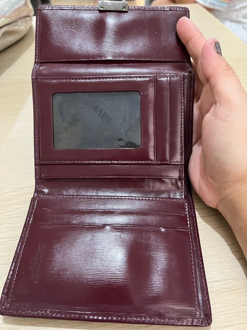 Balmain Paris trifold wallet (Category: Luxury Bags & Wallets) located in Cabuyao City. Submitted by yhaniesgph (Listing ID 1380528267, Image 3). Description: Get this for 100 pesos until Oct 31, minimum purchase is 300 - above (sale items not included) Thrifted item. Still in very good condition. Main issue is May tarnish na ung snap closure nya at zipper puller. .