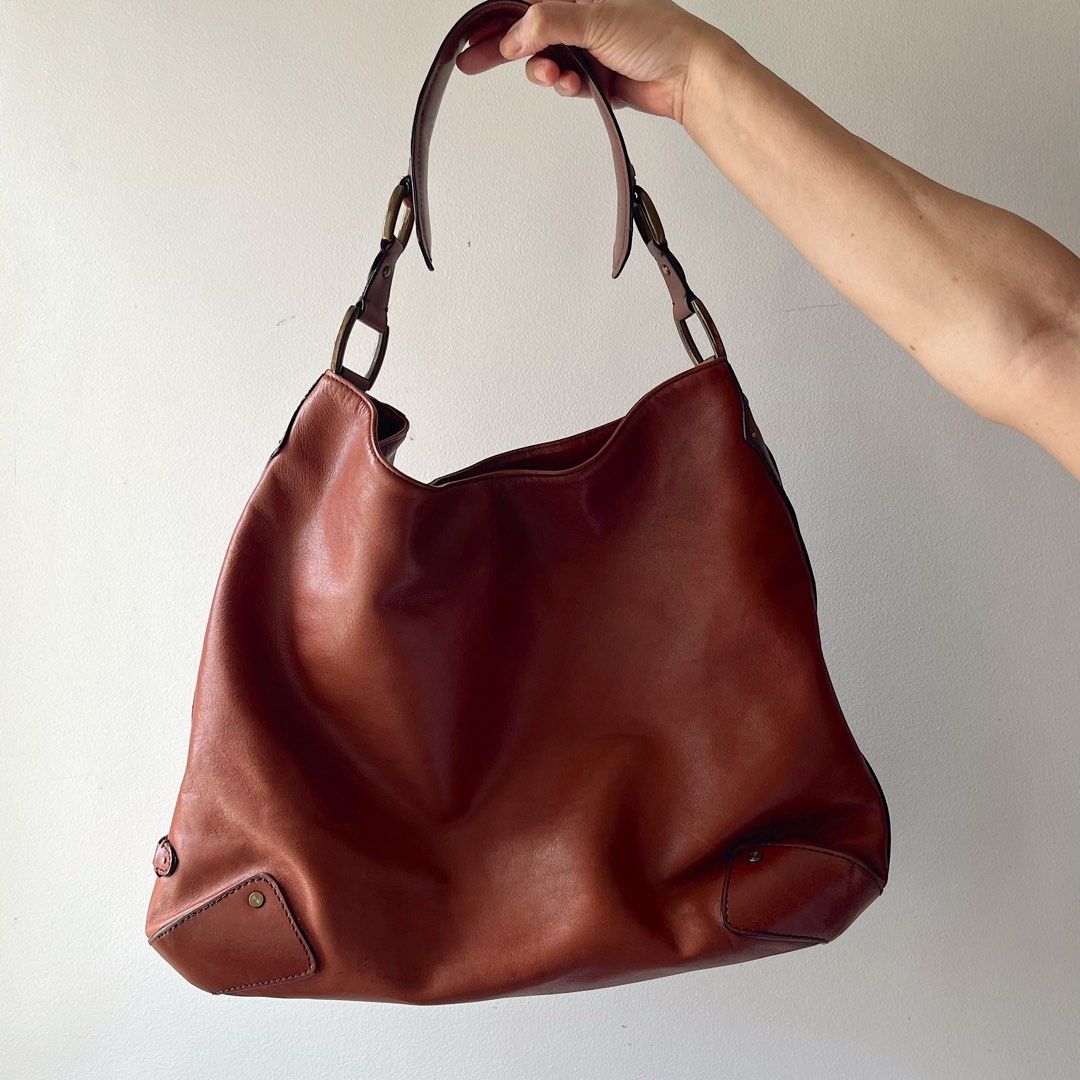 Cole Haan Brown Leather Hobo Bag (Category: Shoulder Bags) located in Makati City. Submitted by 4635archives (Listing ID 1380582686, Image 1). Description: Cole Haan Brown Leather Hobo Bag Large Size Gorgeous brown color! Perfect for everyday Almost like new.