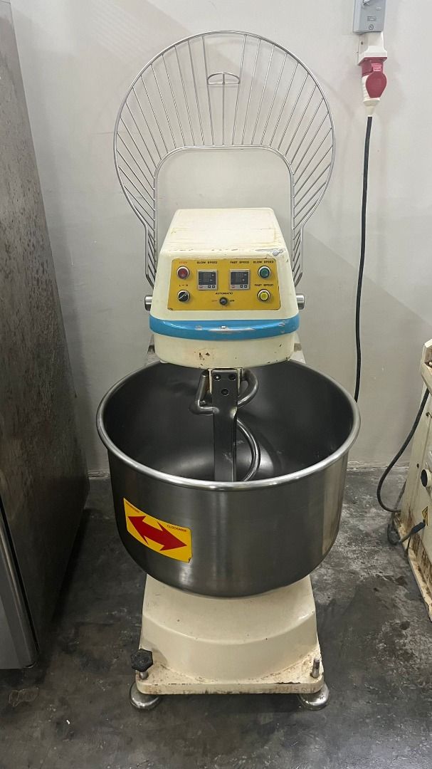 Commercial Bakery Equipment - Various Items (Category: Other Kitchen Appliances) located in Singapore. Submitted by windtankh (Listing ID 1380568996, Image 1). Description: Selling a variety of commercial bakery equipment. Includes a spiral mixer, dough divider, 4-door refrigerator, 4 Deck oven, and various trays and bread trolley. All items are in good working condition. Contact me at 86698981 for individual pricing and details on each item..