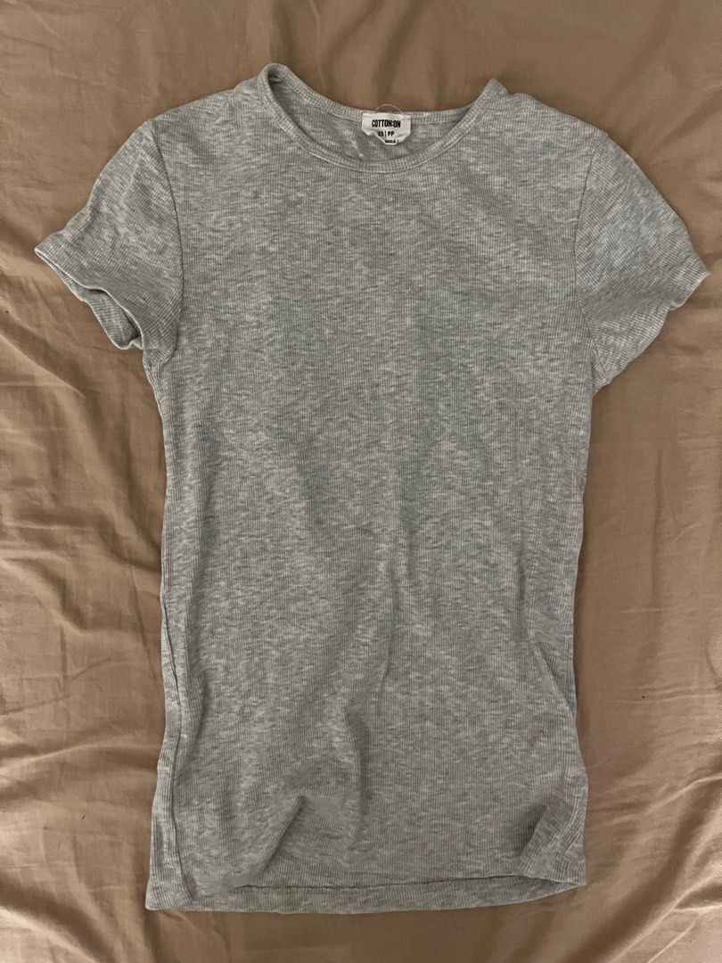 cotton on grey basic tee (Category: Shirts) located in Manila. Submitted by closellt (Listing ID 1380649297, Image 2). Description: - tried on and washed but never worn out - tight fitting and super cute ggx or sdd pay maya or gcash tags: cotton on, mango, zara, bershka.