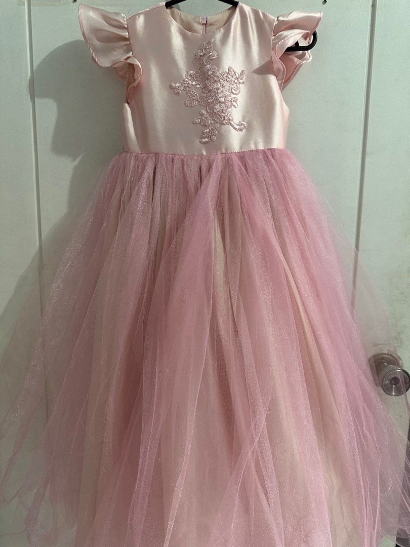 Eckroo Pink Gown Dress (Category: Babies & Kids Fashion) located in Paranaque City. Submitted by npineda13 (Listing ID 1380540581, Image 2). Description: Eckroo in tag Size 4 Fits 4-5yo girl petite 3800 mall price Pink na pink in actual Almost new Preloved by my daughter, worn only for Moving Up ceremony.