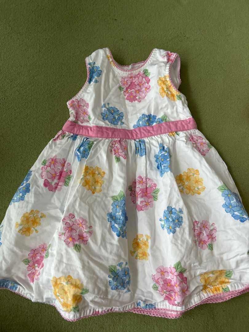 Floral Print Toddler Dress (Jojo Maman Bebe) (Category: Babies & Kids Fashion) located in Singapore. Submitted by psl156 (Listing ID 1380544986, Image 1). Description: Adorable baby dress featuring a beautiful floral print. The dress has a pink ribbon detail at the waist and a delicate trim along the hem. Perfect for a special occasion or everyday wear. In good condition, ready for a new home! My daughter has outgrown. .