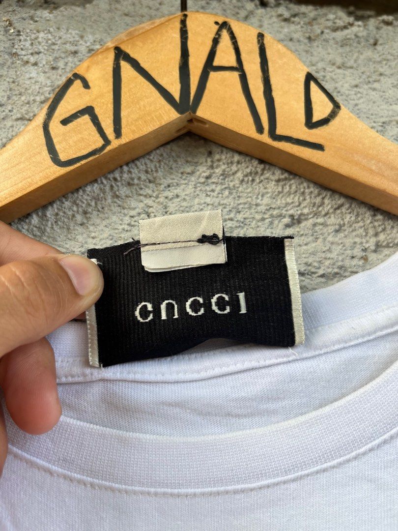 GUCCI - White T-shirts (Category: Luxury Apparel) located in Naga. Submitted by fresh_fit (Listing ID 1380547942, Image 3). Description: GUCCI - White T-shirts Size : S on tag (can fit up to M-L ) Width : 20 Length : 25 Color rate : 9.5/10 Excellent Condition Issue : none /need wash 1200 + sf Actual color may slightly vary due to lighting Location: Bicol Naga City 💵 MOP: Gcash only (payment first) 🚛 courier : J&T Express.