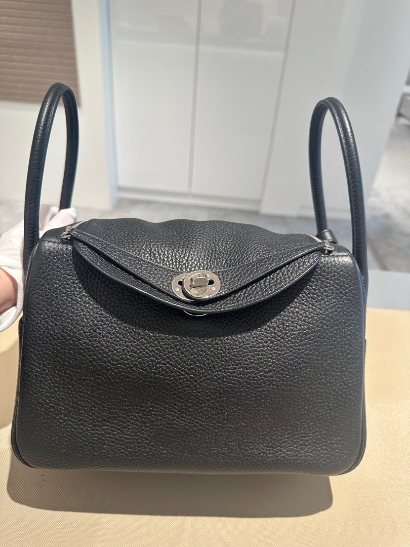 Hermes Lindy 26 Black TC PHW (Category: Bags & Wallets) located in Singapore. Submitted by ginzaxiaoma.sg (Listing ID 1380521471, Image 2). Description: Comes with receipt, felt, dustbag, booklet, raincover Stamp: Y Category: Lindy 26 Color: Black Material: TC Hardware: Palladium Hardware N. 30032408 💯 Authenticity guaranteed Welcome to view before buying! Feel free to visit us, appointment preferred!! 📍23rd Floor 23-05/06, Ngee Ann City Tower 