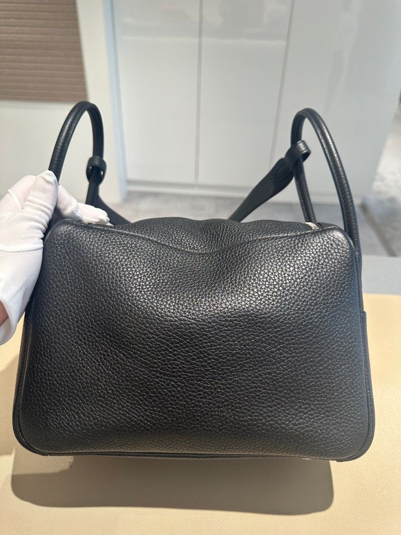 Hermes Lindy 26 Black TC PHW (Category: Bags & Wallets) located in Singapore. Submitted by ginzaxiaoma.sg (Listing ID 1380521471, Image 3). Description: Comes with receipt, felt, dustbag, booklet, raincover Stamp: Y Category: Lindy 26 Color: Black Material: TC Hardware: Palladium Hardware N. 30032408 💯 Authenticity guaranteed Welcome to view before buying! Feel free to visit us, appointment preferred!! 📍23rd Floor 23-05/06, Ngee Ann City Tower 