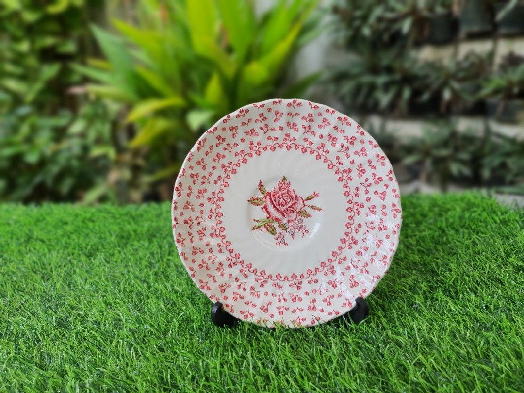 Johnson's Brothers Porcelain Saucer (Category: Dinnerware & Cutlery) located in Quezon City. Submitted by sgoecss005 (Listing ID 1380569901, Image 1). Description: Johnson's Brothers Porcelain Saucer w/ Red Floral Design Dishwasher and Microwave Safe.