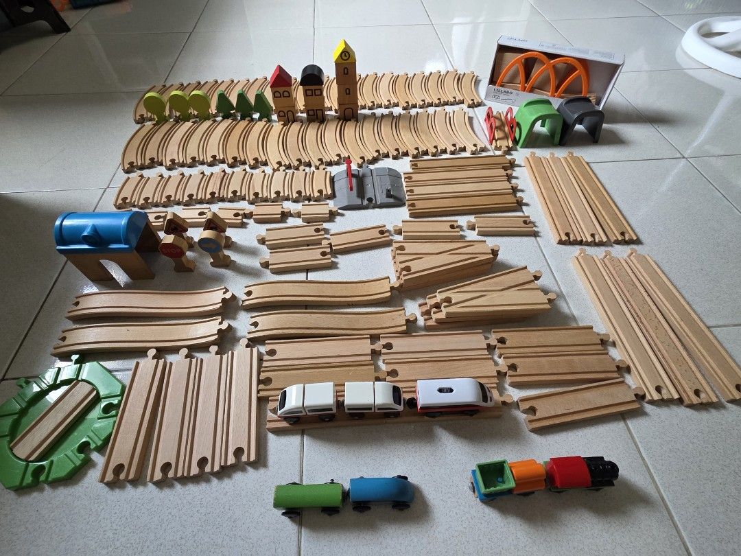 Lillabo Wooden Toy Train (Category: Educational & Learning Toys) located in Quezon City. Submitted by xia_ko (Listing ID 1380559259, Image 2). Description: - Only the railroad crossing is damaged and has a missing part. - One train set is missing a red train car. - I’m not sure what’s missing from the other train set. - FREE plush toy of Riyu, the baby dragon from the LEGO Ninjago Reason for selling: No longer played with by my child..