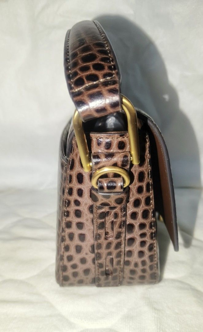 Lovcat Croc style (Category: Luxury Bags & Wallets) located in Baguio. Submitted by kriszyl (Listing ID 1380675132, Image 2). Description: BOUGHT NEW WITH DUST BAG. NA-STOCK NA SA BAG CLOSET, HENCE SELLING LOW. PLEASE SEE PHOTOS AND MESSAGE ME FOR INQUIRY..