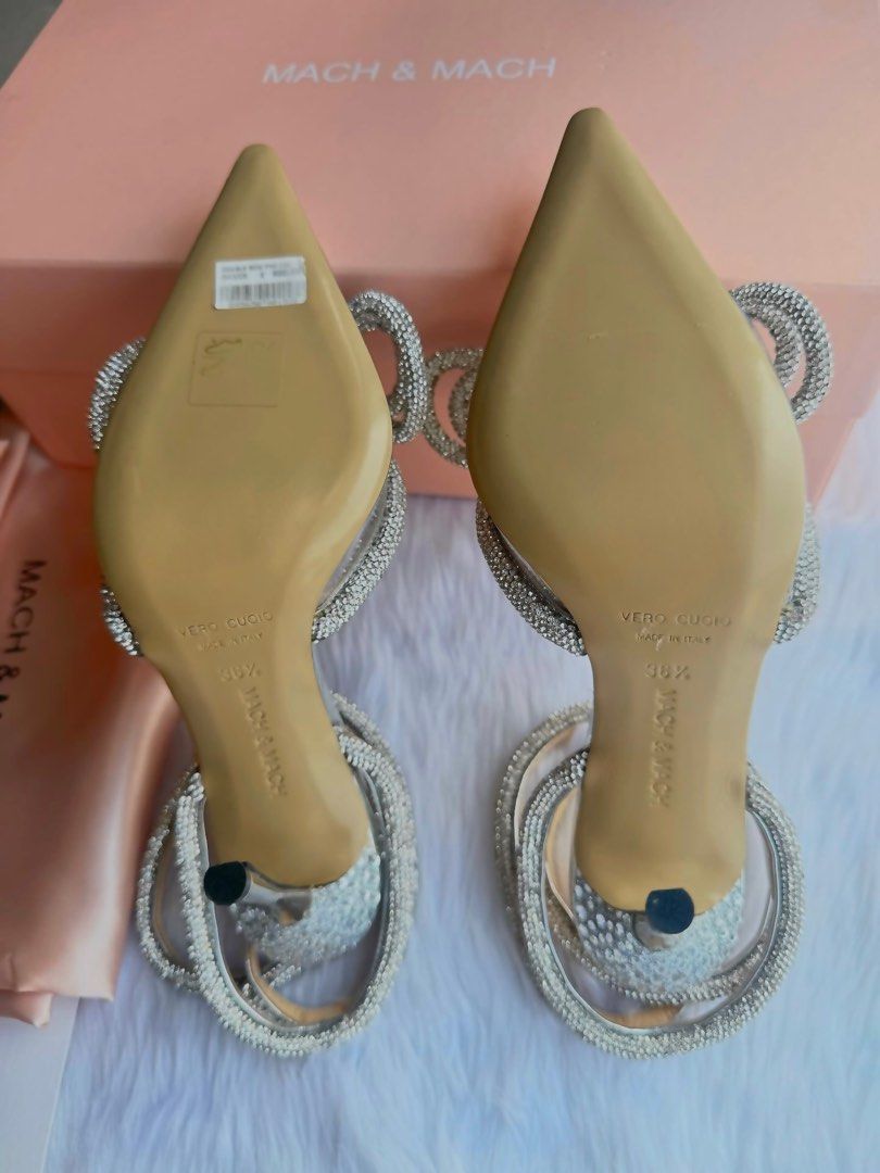 Mach & Mach Bling Sandal (Category: Sandals) located in Taguig. Submitted by aa_decluttering (Listing ID 1380596844, Image 3). Description: Mach & Mach Double Bow Crystal PVC Pump Color: Silver Size: 36 1/2 US Womens Bought in London for £900. Selling for only 33,000 php. With store receipt.
