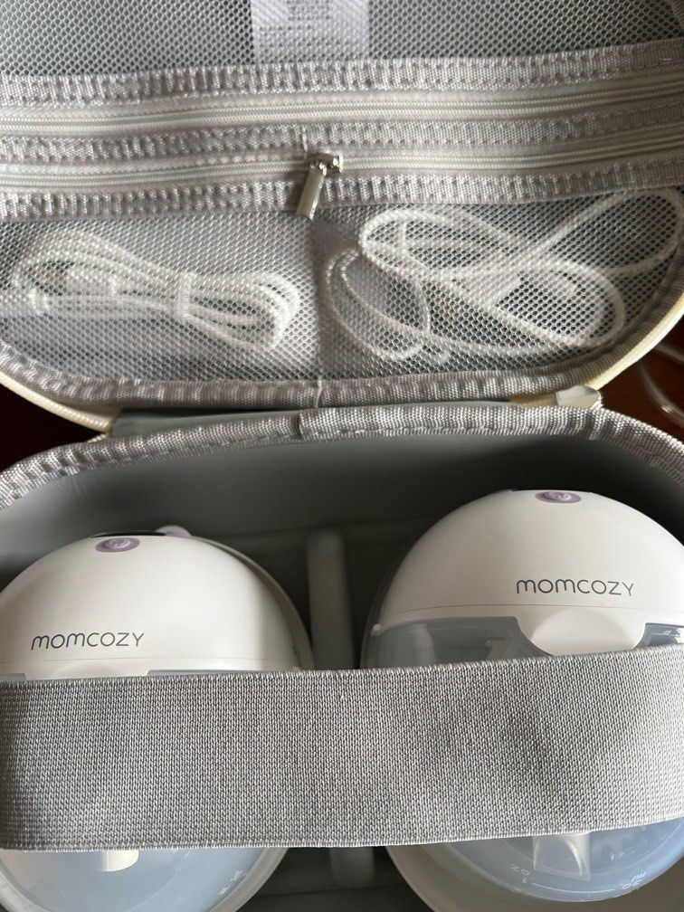 Momcozy M5 with extra collector and free shipping (Category: Breastfeeding & Bottle Feeding) located in Singapore. Submitted by er.nemat (Listing ID 1378305495, Image 2). Description: Selling momcozy m5 comes with an extra set of milk collector which is hardly used once or twice and an extra diaphragm. The pump has been used only a few times. Bought on May 29. So still under warranty. Can provide free delivery..