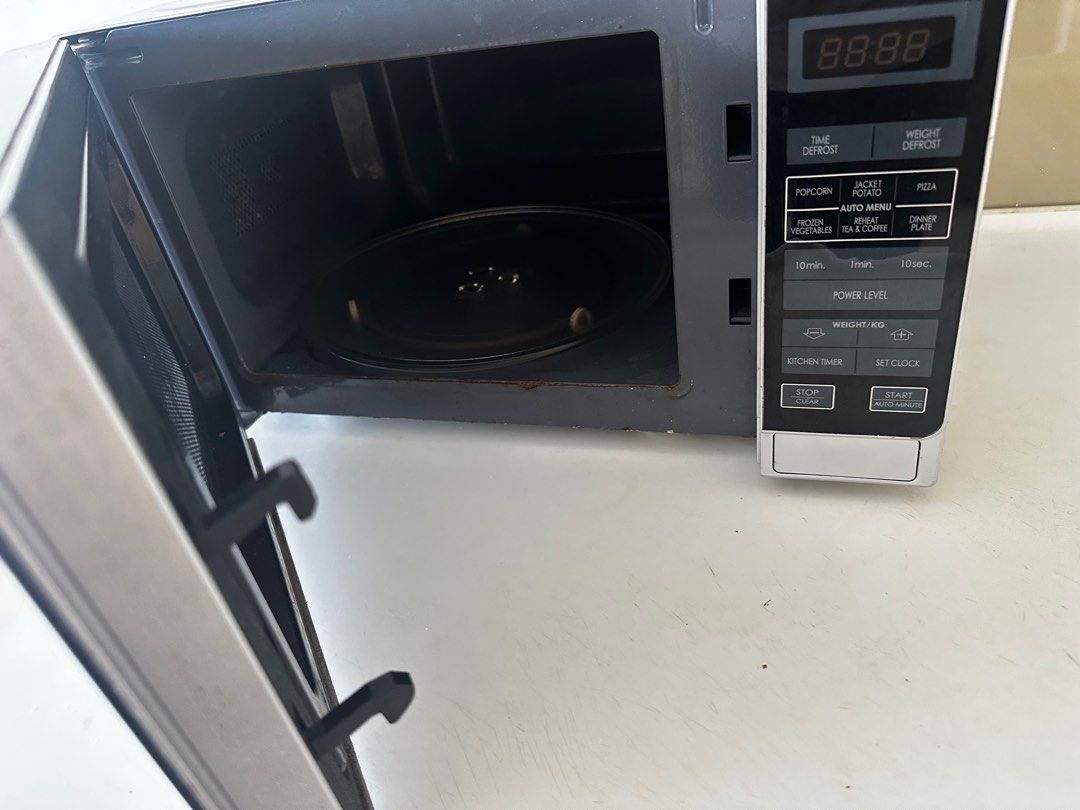 Sharp Microwave (Category: Ovens & Toasters) located in Singapore. Submitted by shrads_04 (Listing ID 1380554363, Image 2). Description: Selling lightly used Microwave because shifted to another house and it is not required as I already got another microwave here. .