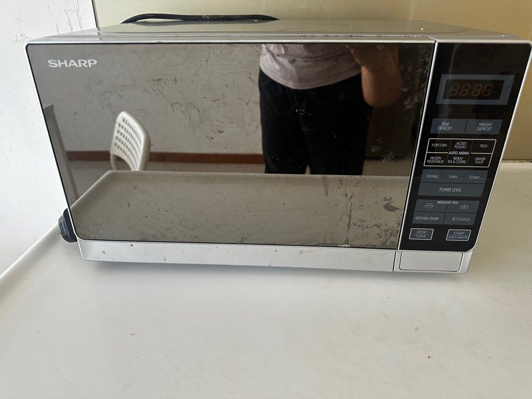 Sharp Microwave (Category: Ovens & Toasters) located in Singapore. Submitted by shrads_04 (Listing ID 1380554363, Image 1). Description: Selling lightly used Microwave because shifted to another house and it is not required as I already got another microwave here. .