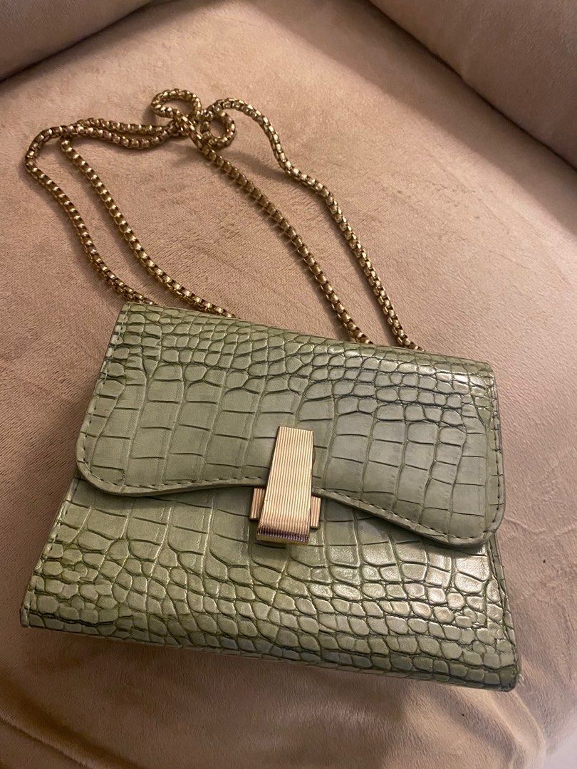Shoulder bag sling bag (Category: Shoulder Bags) located in Makati City. Submitted by jielato (Listing ID 1380678537, Image 1). Description: Color teal green.