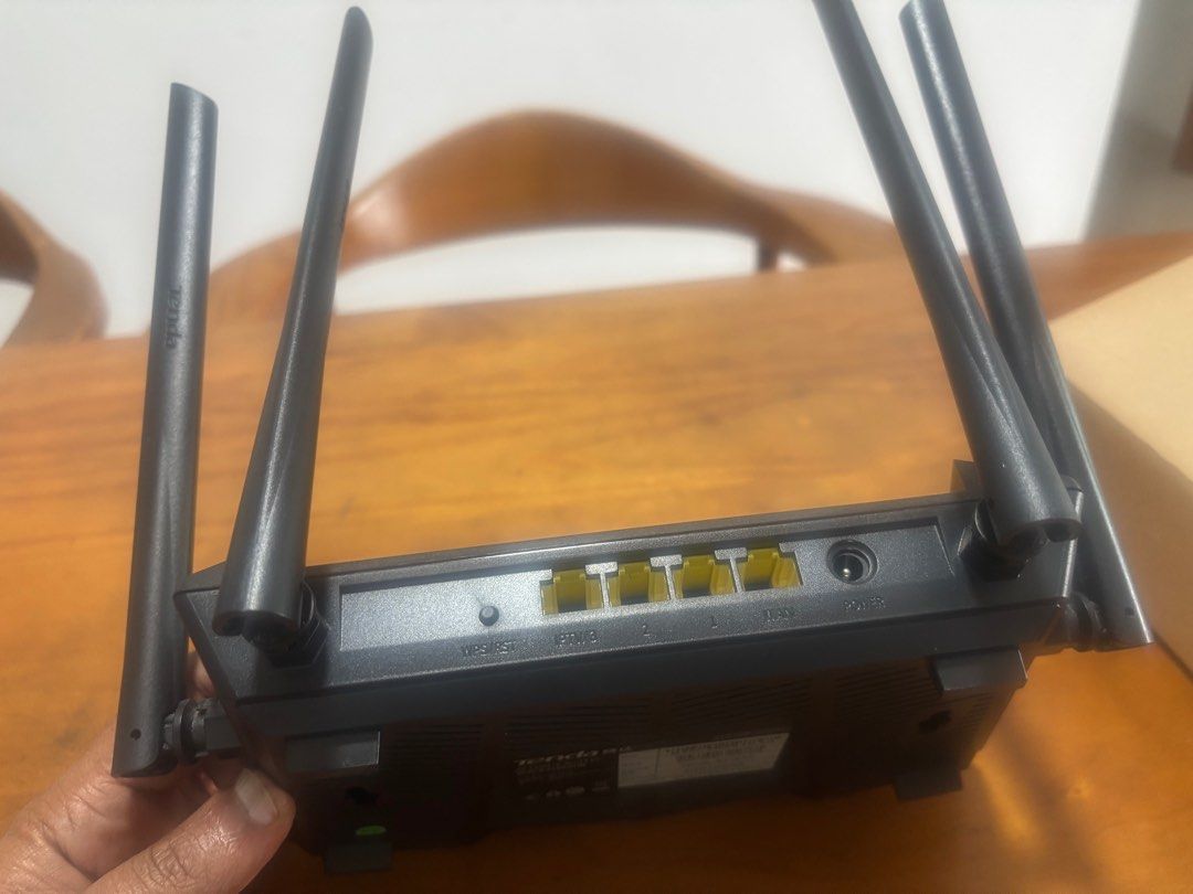 Tenda AC1200 Wifi Router (Category: Networking) located in Singapore. Submitted by Flexi2022 (Listing ID 1380544310, Image 3). Description: Tenda AC1200 Wi fi router with 4 antennas and cable ports - We got a free wi fi router after renewing the broadband subscription No defects Self collect .