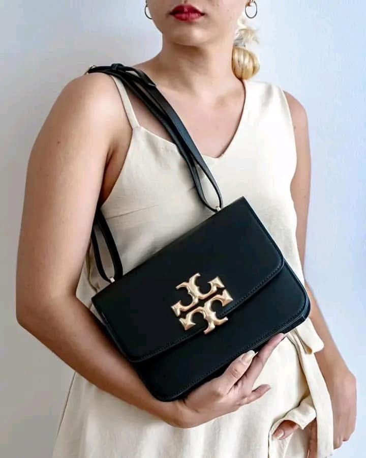 Tory Eleanor Convertible Shoulder Bag (Category: Luxury Bags & Wallets) located in Manila. Submitted by msddirectfactoryoutlet (Listing ID 1380625048, Image 1). Description: Size Eleanor Convertible Shoulder Bag 7In x 9.75In x 3.25In.