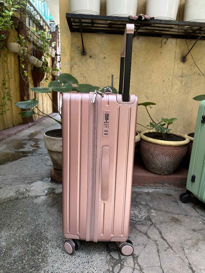 Travel Basic MEDIUM LUGGAGE PINK (Category: Luggage) located in Manila. Submitted by geastoystoreatbp (Listing ID 1380535764, Image 2). Description: TSA LOCK hard case medium 24 inches.