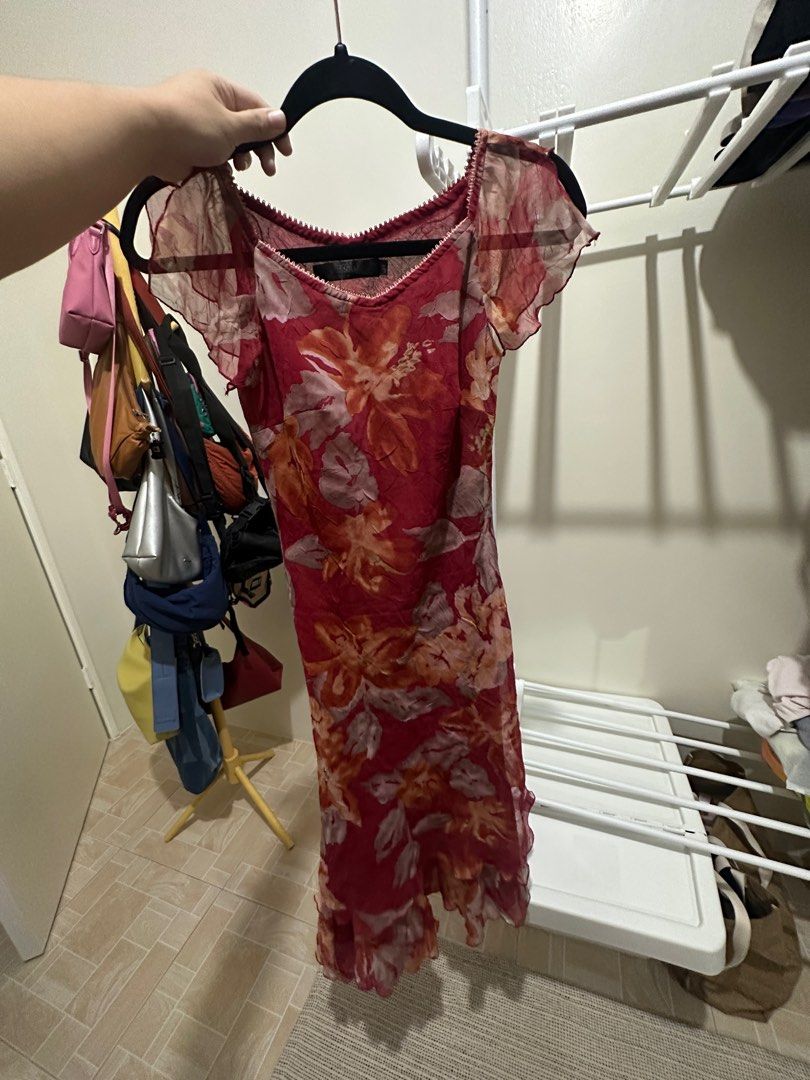 Vintage asymmetrical dress (Category: Dresses) located in Manila. Submitted by hellopanda_07 (Listing ID 1380608038, Image 3). Description: Straight from storage room. Not yet wash Lalamove only!! Shoulder by the buyer. Location: Marikina.