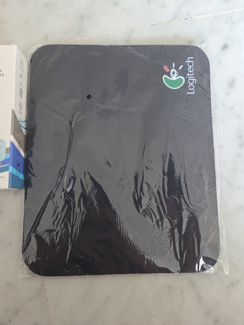 Wireless Mouse - Brand new + MousePad free (Category: Mouse & Mousepads) located in Singapore. Submitted by blurlove7 (Listing ID 1380519192, Image 3). Description: - Brand new wireless mouse - Comes in original packaging - Sleek silver design - Perfect for work or leisure - Easy to set up and use - Free mousepad.