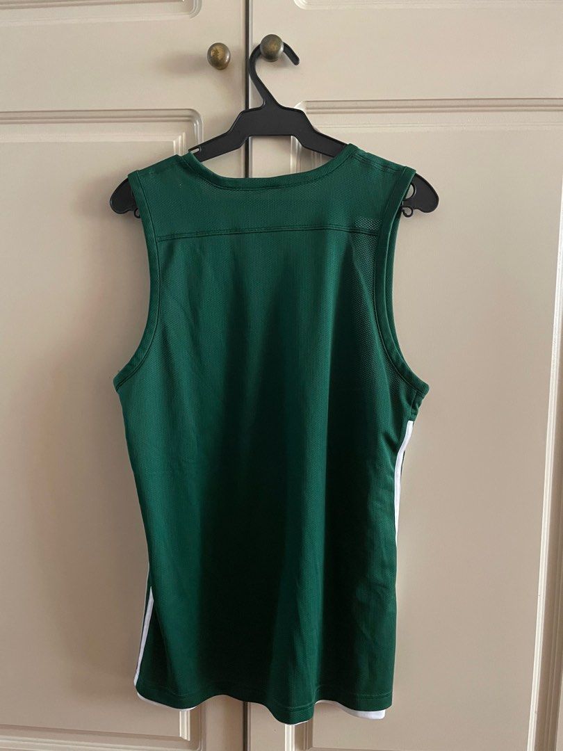 Adidas reversible green/white jersey top (Category: Activewear) located in Makati City. Submitted by crisbeooo (Listing ID 1380741527, Image 2). Description: Authentic Adidas Size XL (cut tag), fits size M-L coz of thicker materials Used for a few times No issues.