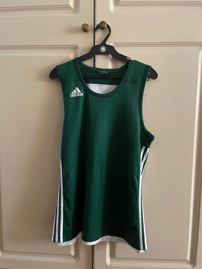 Adidas reversible green/white jersey top (Category: Activewear) located in Makati City. Submitted by crisbeooo (Listing ID 1380741527, Image 1). Description: Authentic Adidas Size XL (cut tag), fits size M-L coz of thicker materials Used for a few times No issues.