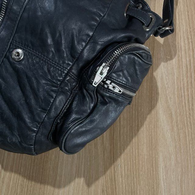 Alexander Wang Gothic 3 Way Bag (Category: Luxury Bags & Wallets) located in Bacolod City. Submitted by classy.glamour (Listing ID 1380768846, Image 3). Description: Alexander Wang Gothic 3 Way Bag Authentic Size: Medium Condition: Very good Flaw: Sign of used.