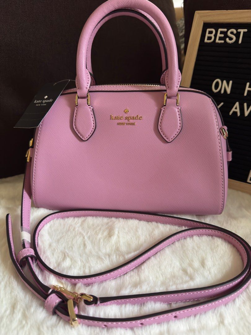Authentic and brand new Kate Spade Duffle Bag (Category: Shoulder Bags) located in Paranaque City. Submitted by markkann (Listing ID 1380879165, Image 1). Description: For Sale!!!! Original, brand new, on hand Kate Spade Madison Safiano leather duffle bag Gold Hardware with detacheable sling 2-way bag - handbag and sling bag Purchased from California, USA.