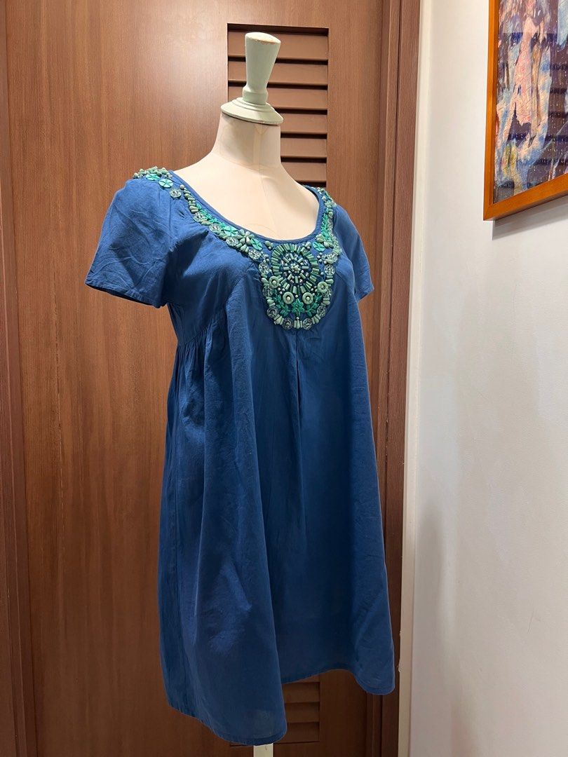 ANTIK BATIK Blue Embroidered Cotton Tunic Dress (Category: Dresses) located in Singapore. Submitted by minni3scloset (Listing ID 1380737790, Image 2). Description: Make a statement in this vibrant blue tunic dress from Antik Batik, a Parisian brand renowned for its bohemian charm and intricate handcraftsmanship. Featuring a richly embroidered neckline in shades of turquoise and jade, this 100% cotton piece combines comfort with artistic detail. I