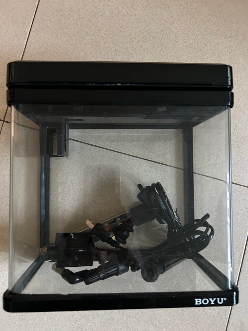 BOYU Aquarium with Filter and LED Light (24x24x15) (Category: Homes & Other Pet Accessories) located in Singapore. Submitted by anthonyliang (Listing ID 1380771681, Image 1). Description: BOYU aquarium (L24cmH24cmW15cm) with built-in filter and LED light. Includes all original components. The tank is in good condition, perfect for small fish or shrimp. Easy to set up and maintain. Great for beginners! Self collect 109B Edgedale Plains (5min walk 