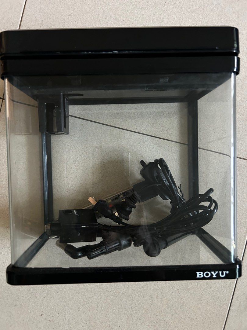 BOYU Aquarium with Filter and LED Light (24x24x15) (Category: Homes & Other Pet Accessories) located in Singapore. Submitted by anthonyliang (Listing ID 1380771681, Image 2). Description: BOYU aquarium (L24cmH24cmW15cm) with built-in filter and LED light. Includes all original components. The tank is in good condition, perfect for small fish or shrimp. Easy to set up and maintain. Great for beginners! Self collect 109B Edgedale Plains (5min walk 