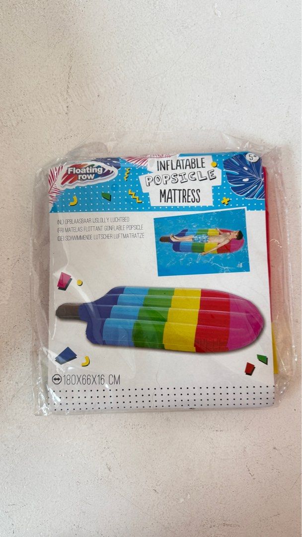 Inflatable Popsicle Float (Category: Kids Toys) located in Singapore. Submitted by withlovetoyou (Listing ID 1380809815, Image 1). Description: Brand new, unopened Floating Row inflatable popsicle mattress. Perfect for a fun day at the pool or beach! Measures 180x66x16cm. Includes a repair kit. Suitable for ages 5+. Get ready for summer!.